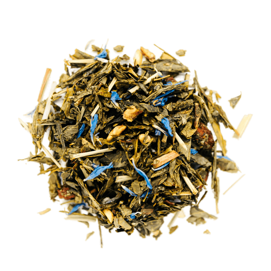 Beguiling Berries Green Tea Loose Leaf Tea leaves sit on a white surface