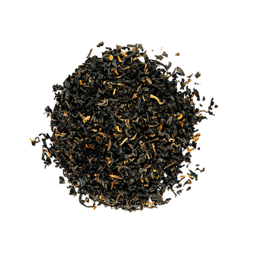 Irish Breakfast Black Tea Loose Leaf Tea leaves sit on a white surface