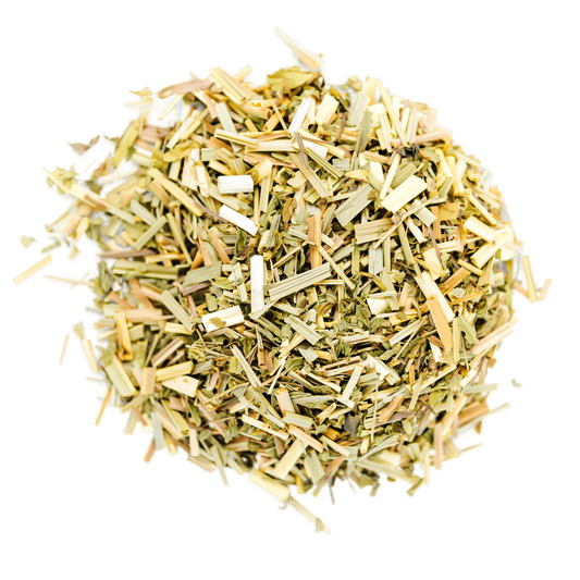 Mint Verbena Herbal Tea Loose Leaf Tea leaves sit on a white surface