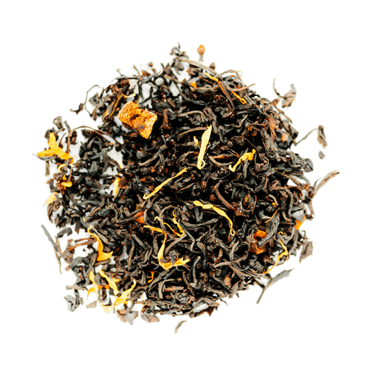 Southern Peach Black Tea Loose Leaf Tea leaves sit on a white surface