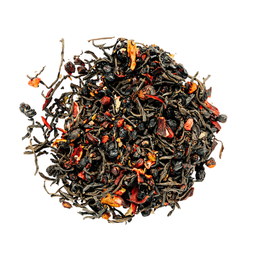 Strawberry Patch Black Tea Loose Leaf Tea leaves sit on a white surface