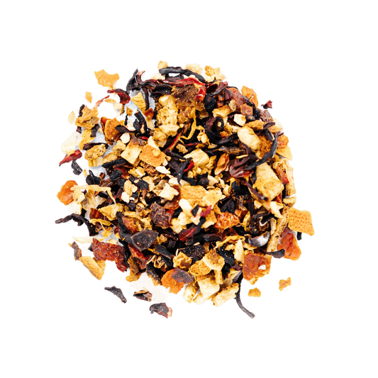 Sunrise Sunset Herbal Tea Loose Leaf Tea leaves sit on a white surface