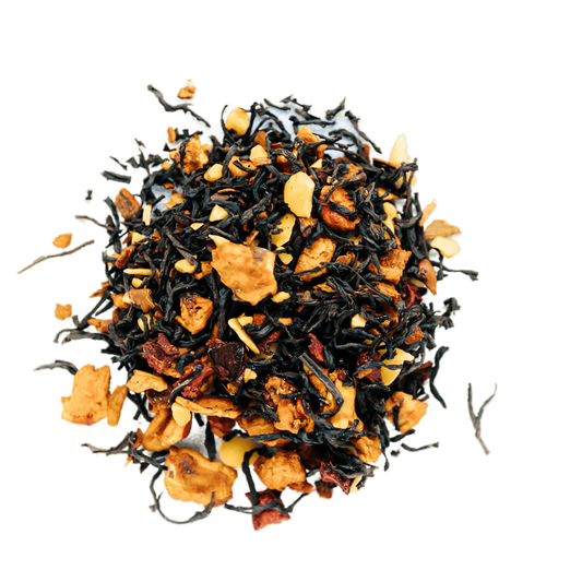 Home Sweet Home Black Tea Loose Leaf Tea leaves sit on a white surface