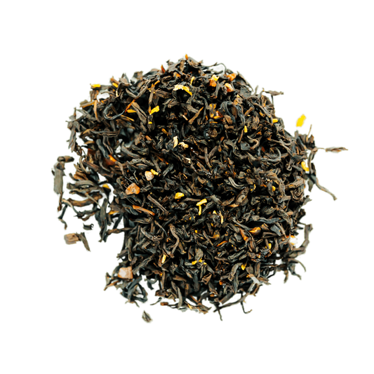 Peppermint Truffle Black Tea Loose Leaf Tea leaves sit on a white surface